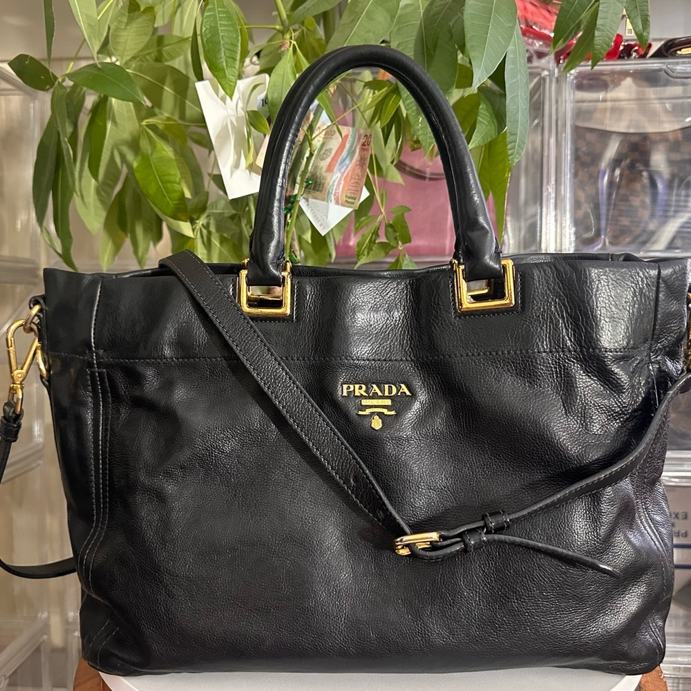 Prada Black Leather Satchel with Gold Hardware. Accept 20% off offer.